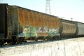 Colorful train on snowy tracks in the winter