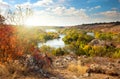 Colorful Trees and River - beautiful sunny autumn season Royalty Free Stock Photo