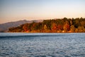 Colorful trees on shore of lake. Evening autumn landscape Royalty Free Stock Photo