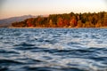 Colorful trees on shore of lake. Evening autumn landscape Royalty Free Stock Photo