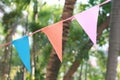 Colorful triangle flag hanging in an outdoor party