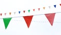 Colorful triangular Flags Hanging in the white sky outdoor Royalty Free Stock Photo