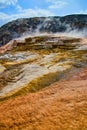Colorful trickling waters of Yellowstone hot spring Royalty Free Stock Photo