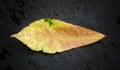 Colorful tropical Almond tree leaf isolated on black background