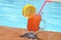 Two Colorful Tropical Cocktails near the Swimming Pool on the Background of Warm Blue Sea. Exotic Summer Vacation. Royalty Free Stock Photo