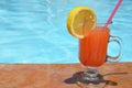 Two Colorful Tropical Cocktails near the Swimming Pool on the Background of Warm Blue Sea. Exotic Summer Vacation. Royalty Free Stock Photo