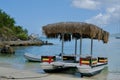 Colorful Boat With Grass Roof on Tropical Beach Royalty Free Stock Photo