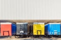 Colorful truck trailers in front of the loading dock of a Dutch warehouse Royalty Free Stock Photo