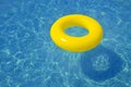 Colorful tube floating in a swimming pool