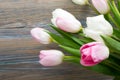 Colorful tulips flowers on wooden table. Top view with copy space Royalty Free Stock Photo