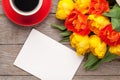 Colorful tulips, greeting card and coffee cup Royalty Free Stock Photo