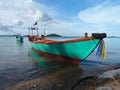 Colorful Turquois Boat near the Cambodia Vietnam Border Royalty Free Stock Photo