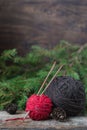 Colorful Tweed Wool Yarn With Wooden Needles With A Firtree Background, Winter Knitting Postcard, Copyspace