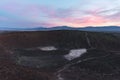 Colorful twilight above a cinder cone Amboy Crater in California