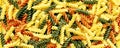 Colorful twirl pasta in tomato and spinach gourmet flavors banner size food backdrop