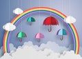 Colorful umbrella in the air with rainbow. Royalty Free Stock Photo