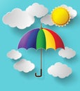 Colorful umbrella flying high in the air Royalty Free Stock Photo