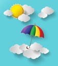 Colorful umbrella flying high in the air Royalty Free Stock Photo