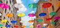 Colorful umbrellas background with blue sky in the city street decoration, Hanging Colorful umbrella in street decoration, Street Royalty Free Stock Photo