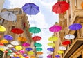 Colorful umbrellas background with blue sky in the city street decoration, Hanging Colorful umbrella in street decoration, Street Royalty Free Stock Photo