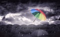 Colorful Umbrella and Black Umbrellas - Being Different Concept