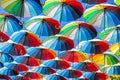 Colorful umbrellas Blue, green, red, rainbow umbrellas background Street with umbrellasin the sky Street decoration