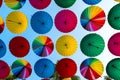Colorful umbrellas disclosed rows