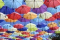 Colorful umbrellas flying in the blue sky Royalty Free Stock Photo