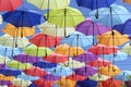 Colorful umbrellas flying in the blue sky Royalty Free Stock Photo