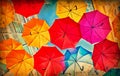 Colorful umbrellas on grunge paper
