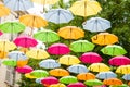 Colorful umbrellas hanging in the air. Royalty Free Stock Photo