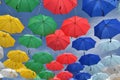 Colorful umbrellas hanging high in the sky