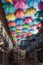 Colorful umbrellas hung over the streets of Agueda, Portugal