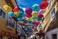 Colorful umbrellas hung over the streets of Agueda, Portugal