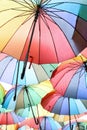 Colorful umbrellas hung on the street