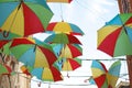 Colorful Umbrellas Over the Street Horizontal