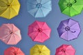 Colorful umbrellas under sky