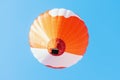 Colorful unbranded hot-air balloon flying