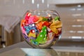 Colorful unfilled balloon in the fishbowl a fish bowl