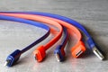 Colorful USB, Micro USB, and Type-C charging cables on gray background for technology and connection Royalty Free Stock Photo