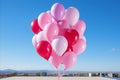 Colorful Valentines Day Sky. Pink Balloons Soaring in a Brilliant Blue Atmosphere