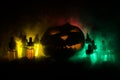 Colorful vape liquids with Halloween pumkin on dark background. Vape concept