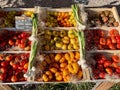 Colorful varieties of tomatoes on sale at local farmers market in Aix en Provence, France. Royalty Free Stock Photo