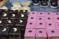 Colorful and variety cakes background on an open shop at Kolkata with selective focus.