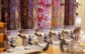 Colorful variety of fruit candies in plastic tubes in a candy store. Jelly beans for sale in the store. Colorful chewing gum balls Royalty Free Stock Photo