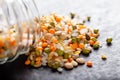 Colorful various beans or lentils and whole grains seeds or cereal in bowl on white background