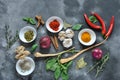 Colorful various of fresh, dried herbs and spices for cooking on a dark background Royalty Free Stock Photo