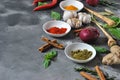 Colorful various of fresh, dried herbs and spices for cooking on a dark background Royalty Free Stock Photo