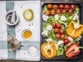 Colorful various organic farm vegetables in a wooden box and seasoning on a napkin place for text,frame on wooden rustic backgr Royalty Free Stock Photo