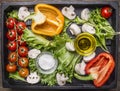 Colorful various of organic farm vegetables in a wooden box wooden rustic background top view close up Royalty Free Stock Photo